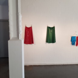 MLF Tarza & Jane red and green latex demi skirts in expo at Galerie vorn und oben